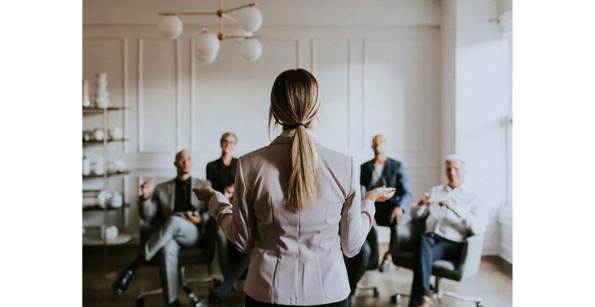 Consider your team’s need | women leading team's meeting and communicating